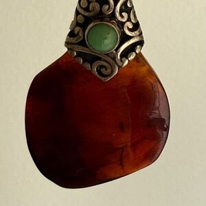 Red amber turquoise and sterling silver pendant